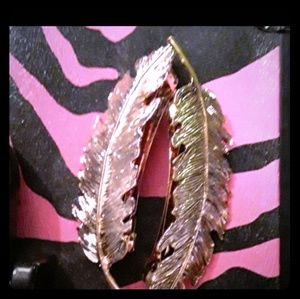 2 Gold feather clips